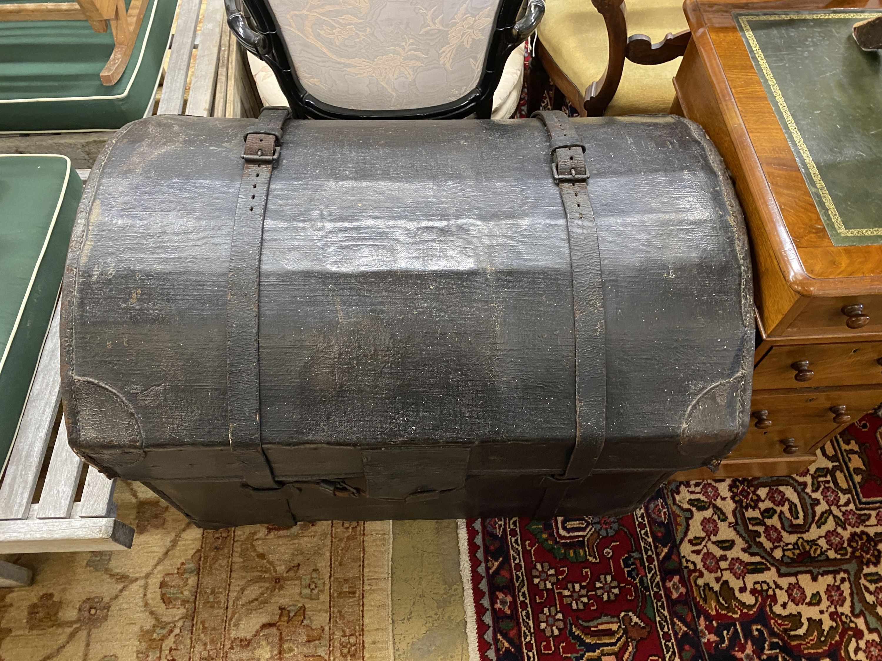 A 19th century large domed leather trunk, length 84cm, depth 60cm, height 66cm